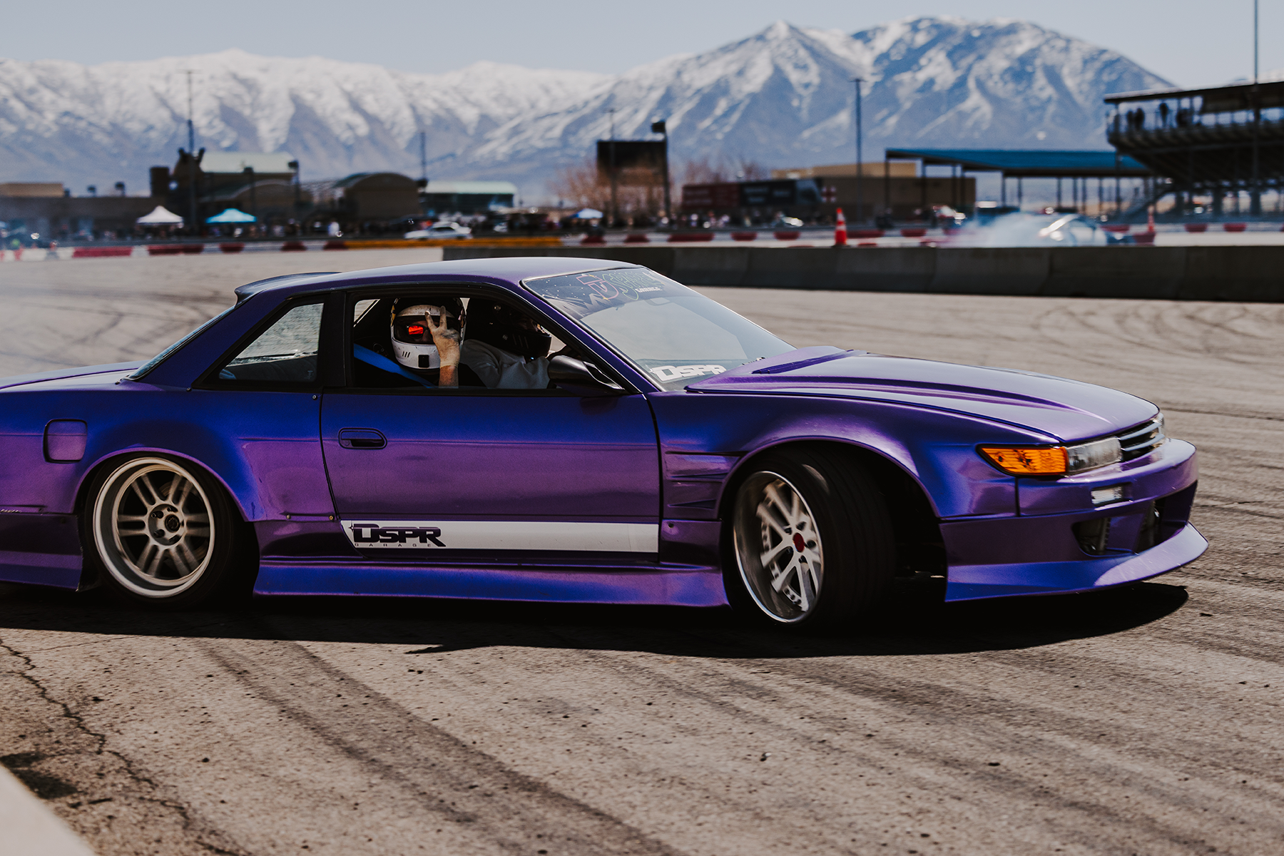 Purple Nissan S13 Silvia drift car at an Import Face Off event, posed under late afternoon light.